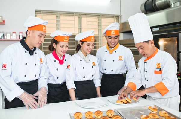 May đồng phục Vĩnh Long